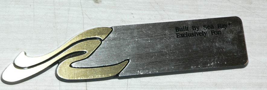 Sea Ray logo emblem, engraving plate "Built For". This product may have minor scratches on it.